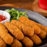 Mozzarella Sticks · 6 pieces. Served with marinara sauce. Add french fries for an additional charge.