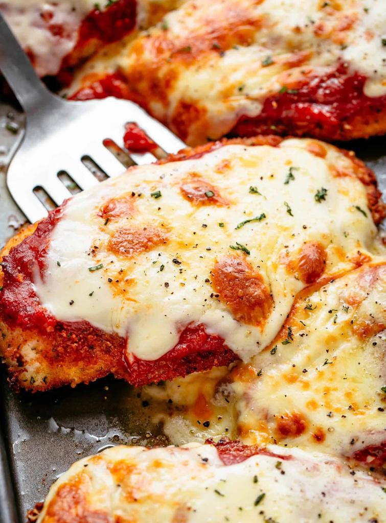 Chicken Fingers Parmigiana · Smothered with homemade marinara sauce, melted mozzarella and Parmesan cheese.
