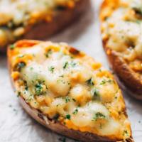 Vegetarian Potato Skins · Sautéed mushrooms, broccoli, chopped red onions and cheddar cheese.