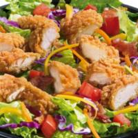 Crunch Ranch Chicken Salad · Sliced chicken tenderloins, mixed mesclun, cheddar cheese, cherry tomatoes, red onions,  cuc...