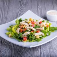 Chicken Caesar Salad · Fresh romaine, fresh diced tomatoes, Parmesan cheese, seasoned croutons, garlic chicken brea...