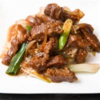 Mongolian Beef · Sauteed beef with onions, bell peppers, carrots and mushrooms.