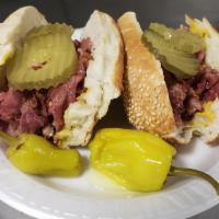 Pastrami Sandwich · Served with mustard and pickles