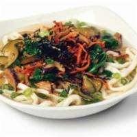 Udon Noodle Soup · Thick white wheat noodles served hot in a savory broth with assorted seasonal vegetables. To...