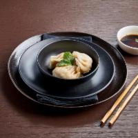 Dumplings · Steamed or fried homemade dumplings filled with veggies and your choice of chicken or pork.