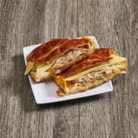 Turkey, Egg and Cheese Sandwich · Turkey and 2 Eggs with cheese served with mayonnaise and dijon mustard on your choice of bre...