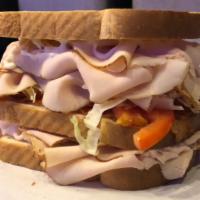 Triple Decker Turkey Club · Toast, Bacon, Lettuce, Tomato and Mayonnaise 