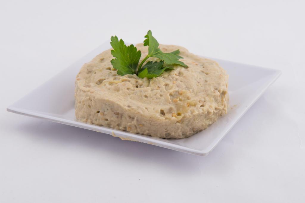 Babaghanoush · Puree of eggplant flavored with tahini, olive oil, onion, and garlic.