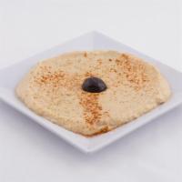 Hummus · Mashed chickpeas mixed with lemon juice, olive oil, tahini, and garlic.