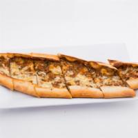 Ground Beef Pide · A thick dough crust stuffed with ground lamb and seasonings. 