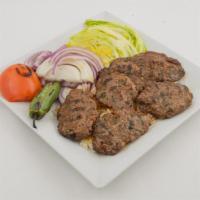 Meatball Kebab Sandwich · Served with lettuce, onion, and tomato with choice of pita, homemade bread, or wrap.