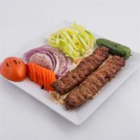 Beef Adana Kebab · Served with lettuce, onion and tomato with choice of pita or home bread. 
