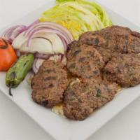 Meatball Kebab · Chopped meat seasoned with black pepper parsley, salt and grilled.