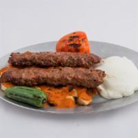 Yogurt Lamb Adana Kebab · Served with bread cubes, tomato sauce and grilled peppers