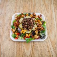 Bacon Cheeseburger Salad · Spring mix and romaine lettuce with bacon, ground beef, onions, pickles, shredded cheddar an...