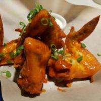 Chicken Wings · Buffalo sauce and blue cheese.