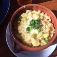 Mac and Cheese · Creamy and macaroni and cheese with scallions.