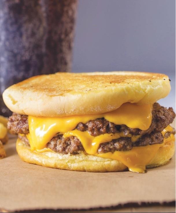 Cheeeesy Burger · Grilled buttered bun and 4 slides of cheese of your choice cheese. Double Pattie. Popular.   Does not come with fries or drink.