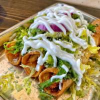 Chicken Taquitos · 3 Chicken taquitos, topped with romaine lettuce, onions, cotija cheese, sour cream & Habaner...