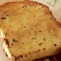 Garlic Bread · Toasted french roll with garlic and butter.