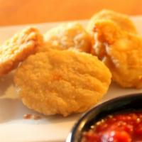 Chicken Nuggets · Fried chicken nuggets with your choose of dipping sauces.