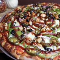 Gluten Free Tex-Mex Pizza · Marinated chicken, red onion, bell pepper, black olive, and jalapeno, with a BBQ swirl.