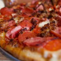 Gluten-Free Meat Lovers Pizza · Pepperoni, Italian sausage, Canadian bacon and seasoned beef. Gluten free.