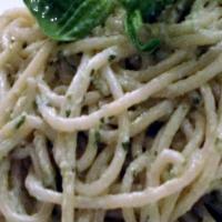 Spaghetti and Pesto Basil  & Garlic Bread · Light creamy pesto made with locally grown fresh basil. Served with garlic bread.
