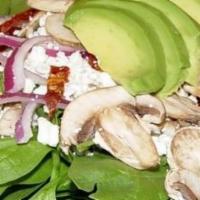 Spinach Salad · Topped with mushroom, red onion, sun-dried tomato, feta cheese and avocado. 