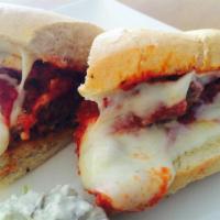 The Classic Meatball Sandwich · Homemade meatballs marinara sauce and baked, topped with mozzarella cheese on a large roll. ...
