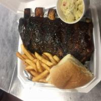 Half Slab Rib Combo · Half Slab of Ribs with our homemade BBQ sauce, side of fries, and side of our homemade potat...