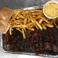 Full Rib Slab Combo · Full Slab of delicious ribs with our homemade BBQ sauce, side of fries, and side of homemade...