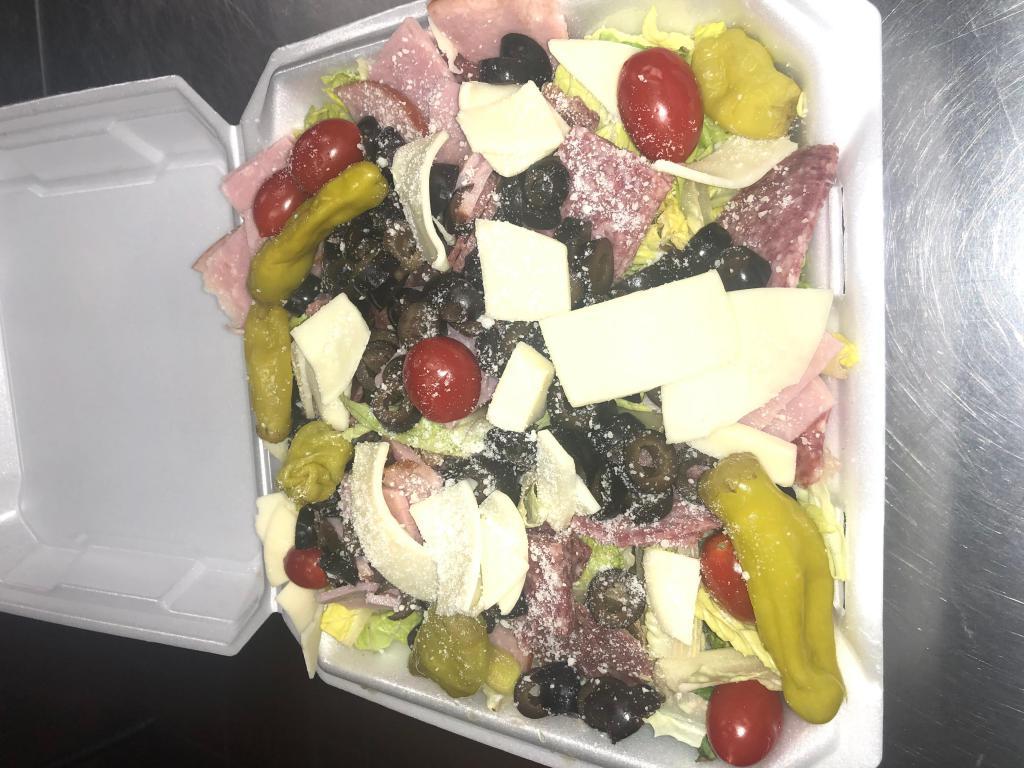 Antipasto Salad · Fresh lettuce, Genoa salami, ham, provolone, olives, pepperoncini and Parmigiana cheese.