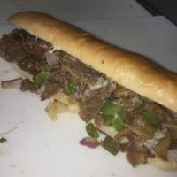 Philly Cheesesteak Sub · Premium steak, cheese, peppers, onions, mushrooms and banana peppers.