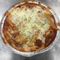 Baked Mostaccioli · Homemade baked mostaccioli with meat and sauce baked in our Baker's Pride Oven.