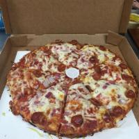 Sammy's Double Stuffed Pizza · A round pizza stuffed with 2 items then topped with cheese.