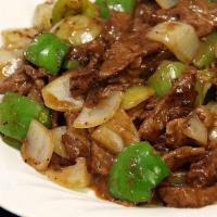 69. Pepper Steak with Onion · Served with rice. 