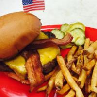 The Patriot Burger · Big 1/2 lb. Burger with 1 side, Pickles, & 1 Sauce. This Burger is as patriotic as they come...
