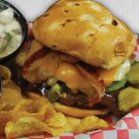 Cheeseburger · Big 1/2 lb burger with 1 side, pickles, and 1 sauce. A marriage of the BBQ staple beef brisk...