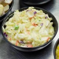 Claire Slaw · Homemade fresh daily cole slaw. Perfect on the side or for your southern style sammies.

