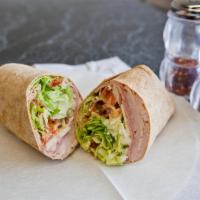 Ham and Turkey Wrap · Smoked turkey and ham with bacon, lettuce, tomatoes, onions and American cheese with ranch d...