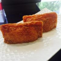 Inari Nigiri · Tofu skin. Sushi, comes as a pair.