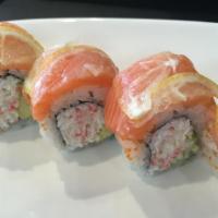 49er Roll · California roll topped with salmon and lemon slices.