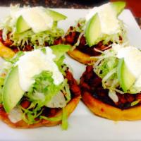 sopecitos · three fried hand made tortilla topped with beans, your choice of meat, lettuce, avocado, sou...