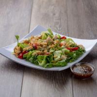 Asian Sesame Salad · Marinated chicken, romaine, grape tomato, mandarin orange, sesame, cilantro, wonton chips an...
