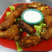 Sizzling Buffalo Wings · Baked not fried. Served with ranch dressing. 