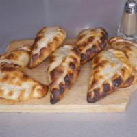 1/2 Dozen Empanadas · Choose from meat, ham and cheese, meat cuchillo, spinach, humita, onion and cheese, calabres...