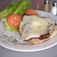 Churrasco Panini · Grilled skirt steak mozzarella, fresh tomato and lettuce. On Homemade Bread.