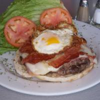 500 Burger · Ham, cheese, grilled onions, fried eggs, lettuce and tomato. On Homemade Bread.