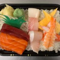 Chirashi Entree · Chef's choice of assorted fresh sashimi over a bed of sushi rice. Served with miso soup.